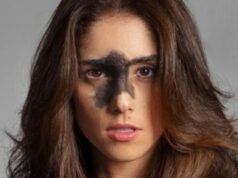 Influencer com pinta no rosto questiona padrões de beleza na internet